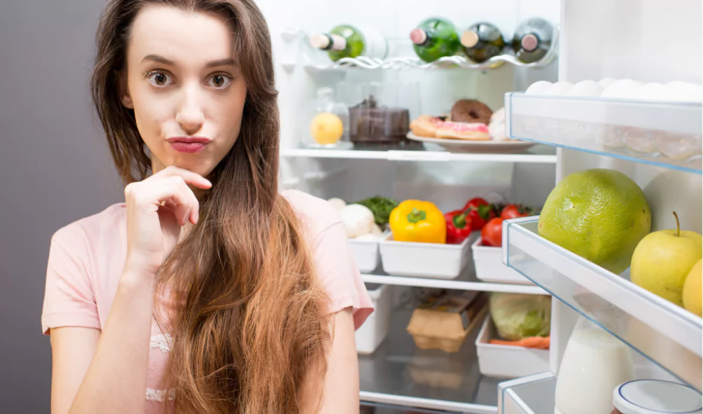 woman concerned about inverter refrigerator