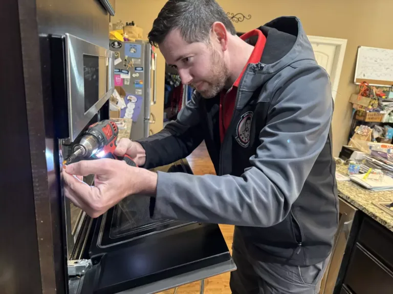 technician installing a wall oven in Greenville SC