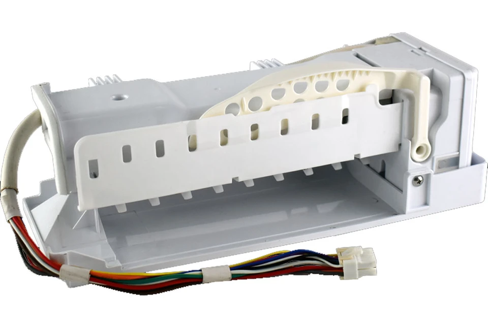 Samsung refrigerator ice maker module showing the tray, ejector arm, motor, and wiring harness